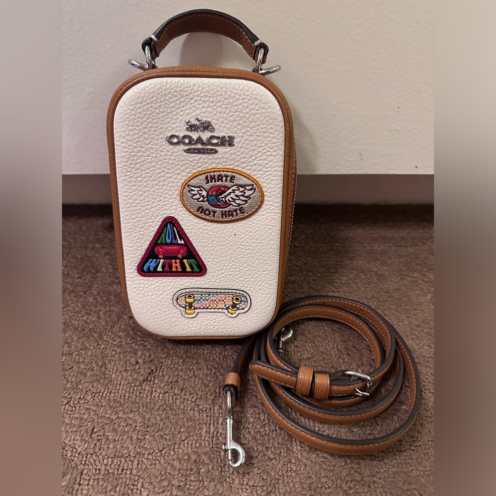 Authentic Coach with Patches-slightly used but in very good condition.